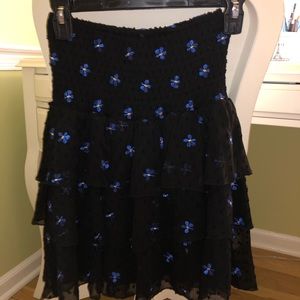 Maje black ruffle skirt with blue flowers